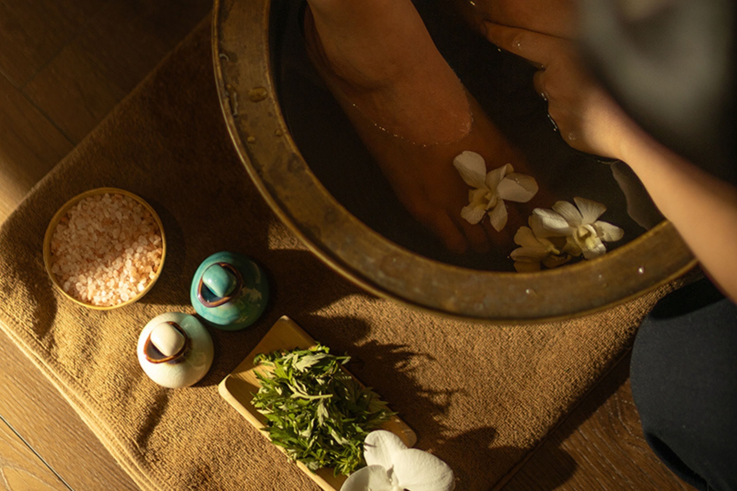Herbal foot treatment aboard Bhaya Soul, Halong Bay